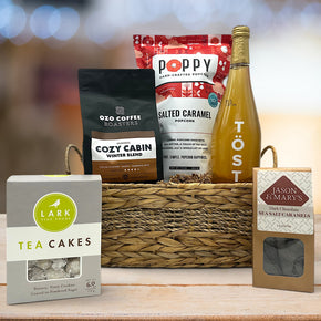 gourmet thank you holiday gift basket with cookies, coffee, popcorn, sparking juice, and sea salt caramels