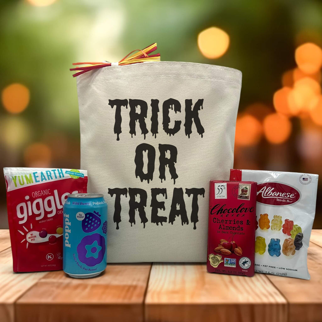 trick or treat halloween gift basket with candies, poppi, chocolate bar and gummy bears