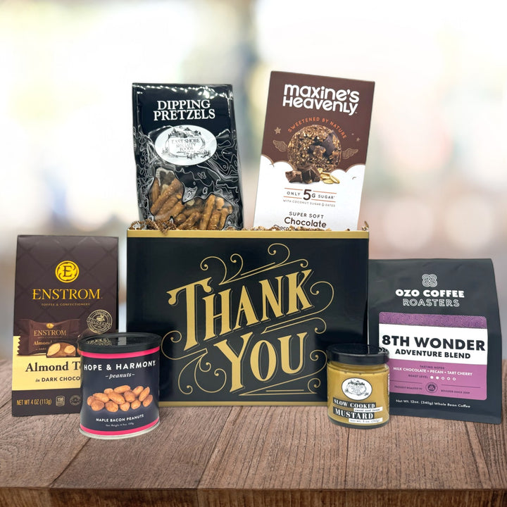 Thank You gift box filled with gourmet snacks including pretzels, cookies, coffee, chocolate, peanuts, and mustard