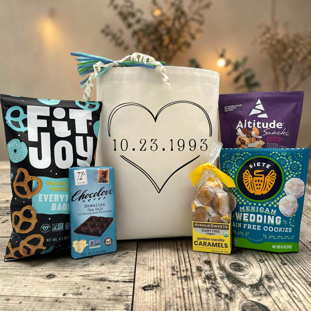 Gourmet anniversary gift basket with pretzels, chocolate bar, caramels, cookies and trail mix