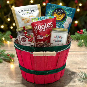Gourmet vegan holiday gift basket with popcorn, cookies, chewy candies, cherry buds and a large candle