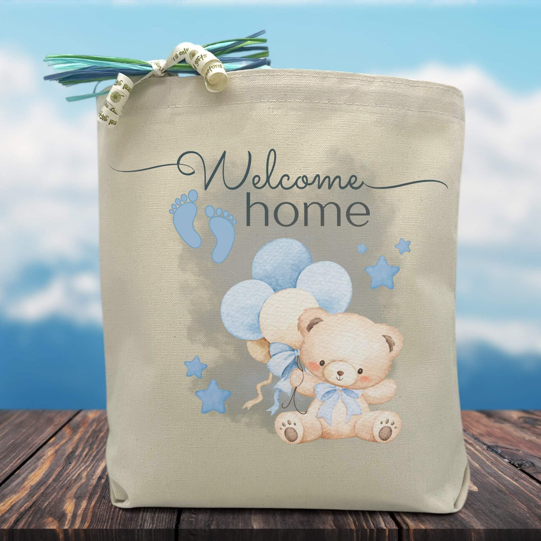 welcome home with bear holding blue balloons printed on bag sitting on table
